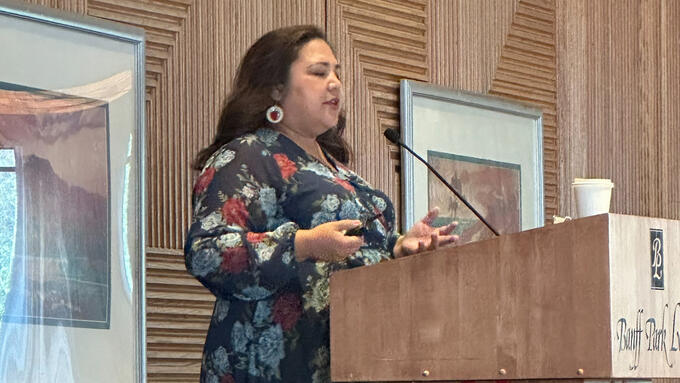 Speaker Koren Lightening, KC presented on reconciliation and allyship at the symposium