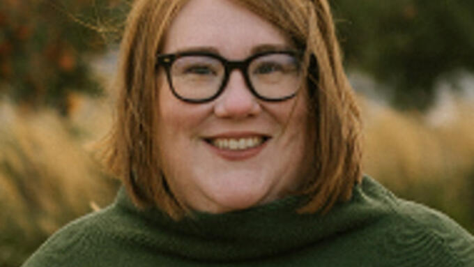 Red haired women in green sweater