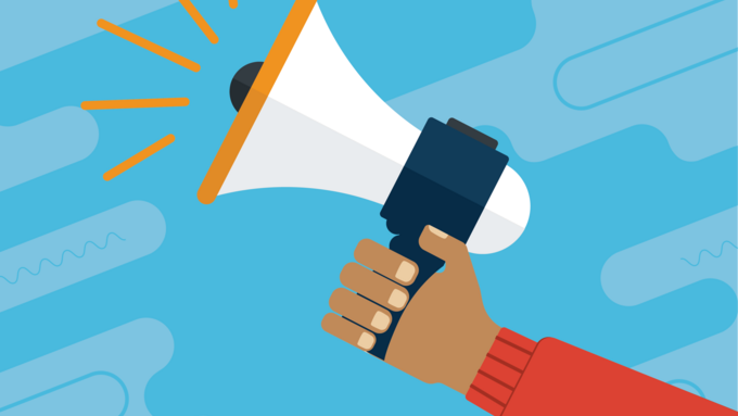 Arm in red sleeve holding a megaphone