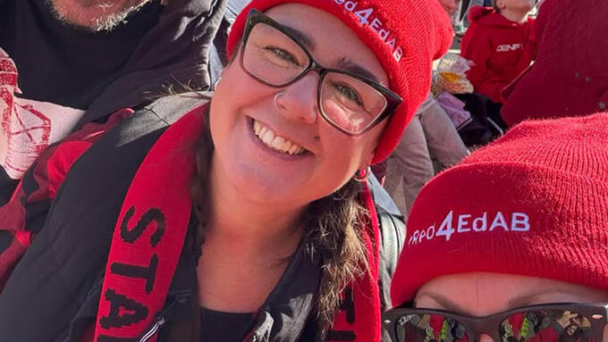 Three teachers at a rally
