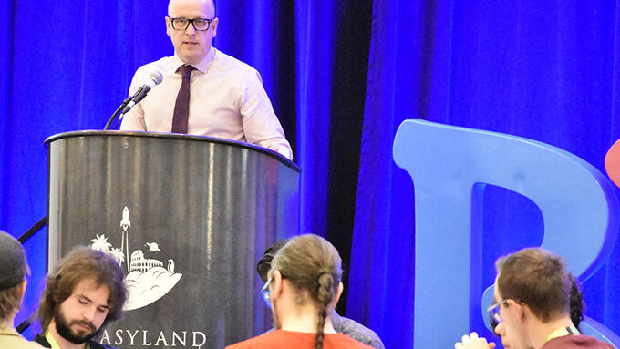 Jason Schilling speaks at a conference