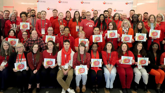 Participants at the CTF/FCE National Staff Conference wear red for ed