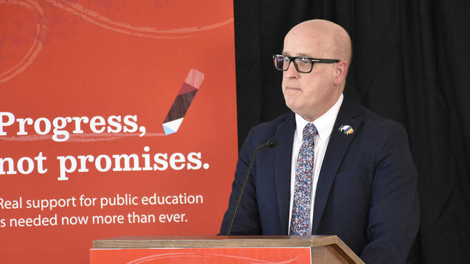 Jason Schilling responding to education budget at a news conference