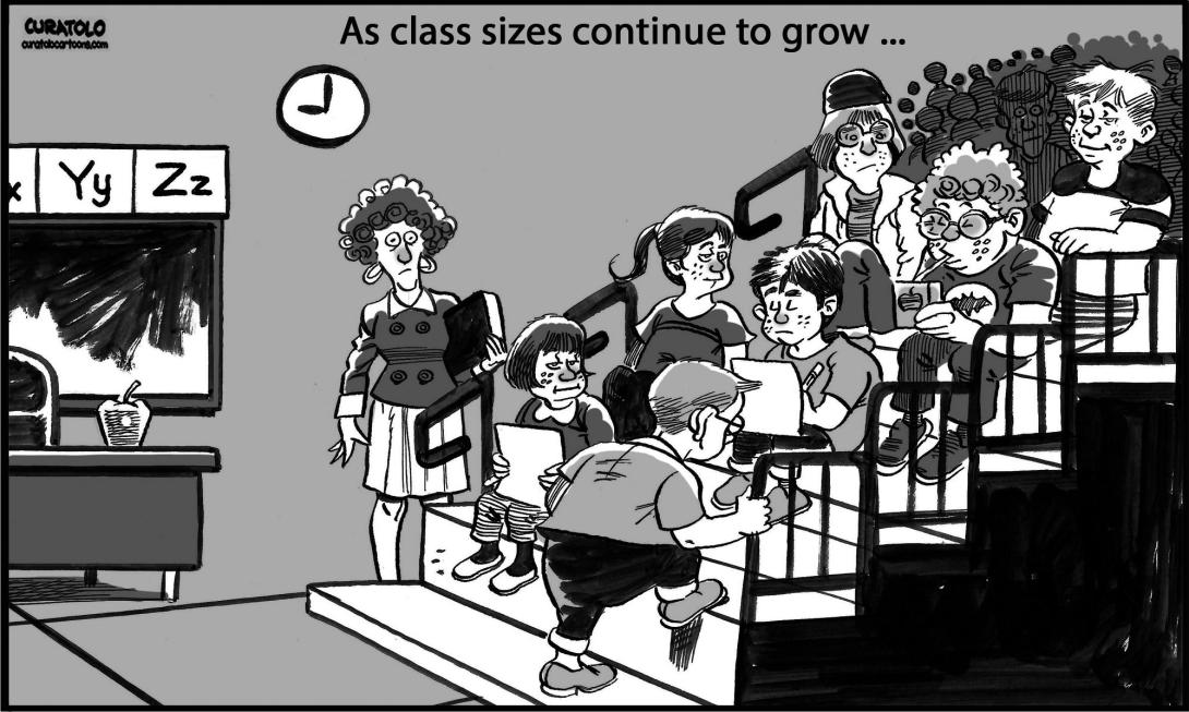 A teacher standing by a chalkboard and desk watches a student climb the bleachers in an overcrowded classroom.