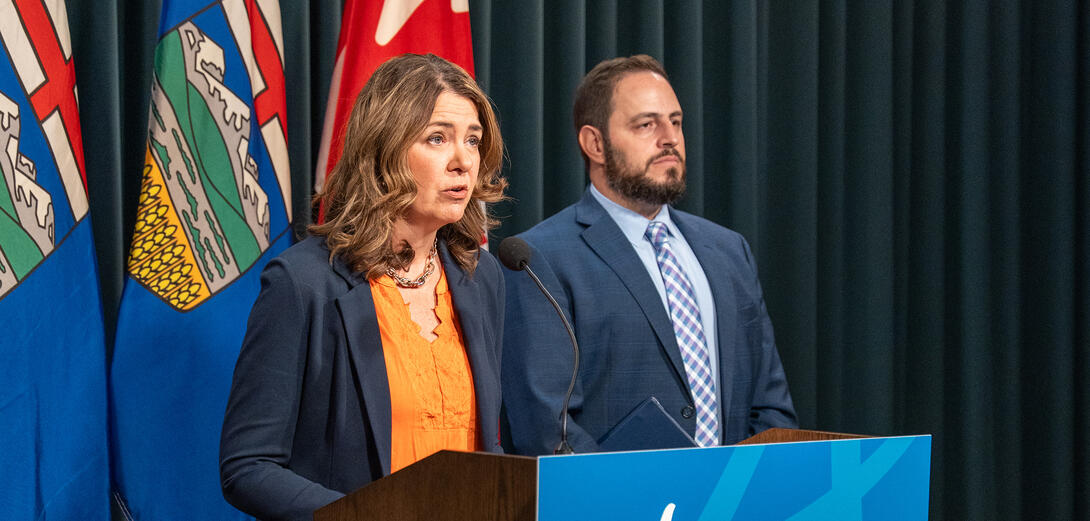 Danielle Smith and Demetrios Nicolaides give a news conference